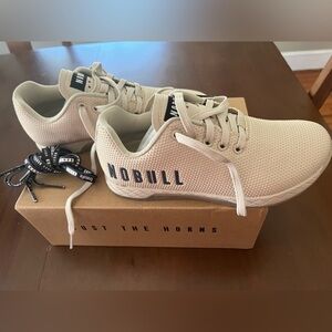 Brand-new, never-worn Women’s NOBULL CrossFit Outwork shoes. Size 7.5. Beige.
